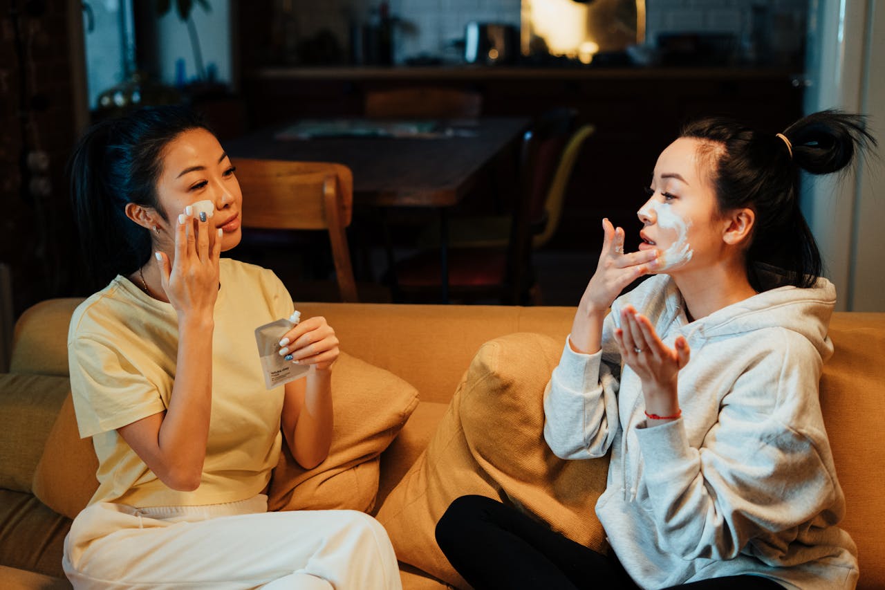 The Art of Drawing Readers In: Your attractive post title goes here Two friends enjoy a relaxing skincare session at home, enhancing their beauty routines together.